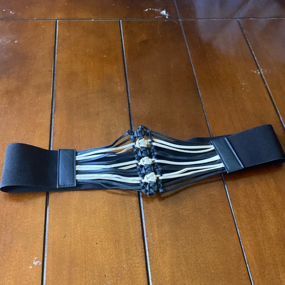 Stretch belt Approximately 40 inches long snaps on back. - Picture 1 of 9